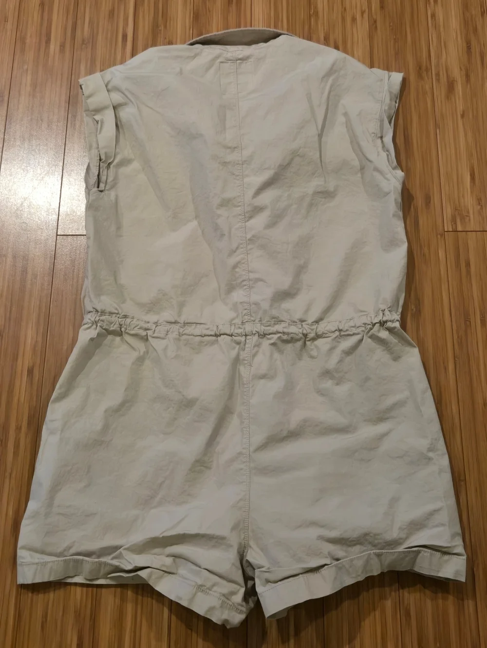 Celeberity Pink Sleeveless Drawstring Romper in Light Beige